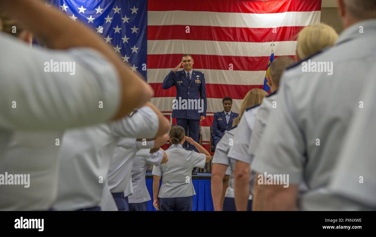 Col. (Dr.) Anthony Waldroup, the new AFMS - Vance - 71st Medical Group commander, returns his first salute to his troops during the group's change of command ceremony here this morning. Among the group's many accolades, the Oklahoma native inherits Air Education and Training Command's Clinic of the Year for 2015 and 2016. Stock Photo