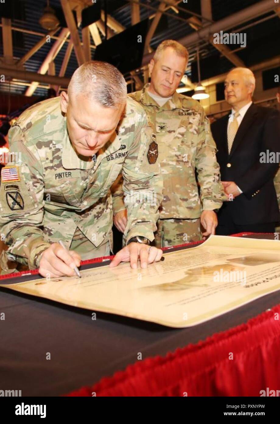 The Installation Management Command Leadership Pledge on display at U.S.  Army Garrison Japan serves as a visual reminder of the Garrison  leadership's support of the IMCOM Service Culture Campaign, launched as an