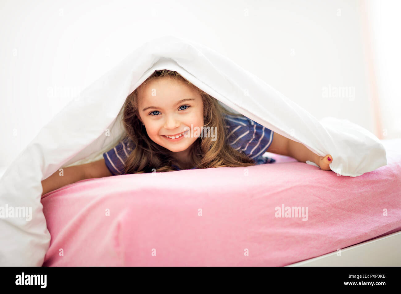 Hiding under bed covers hires stock photography and images Alamy