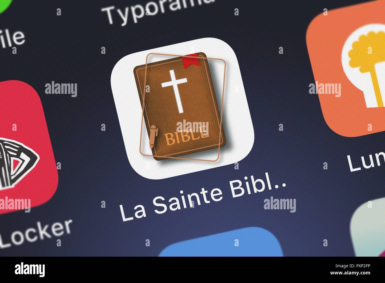 London, United Kingdom - October 23, 2018: Close-up of the La Sainte Bible Darby en Français (French Audio) icon from Oleg Shukalovich on an iPhone. Stock Photo