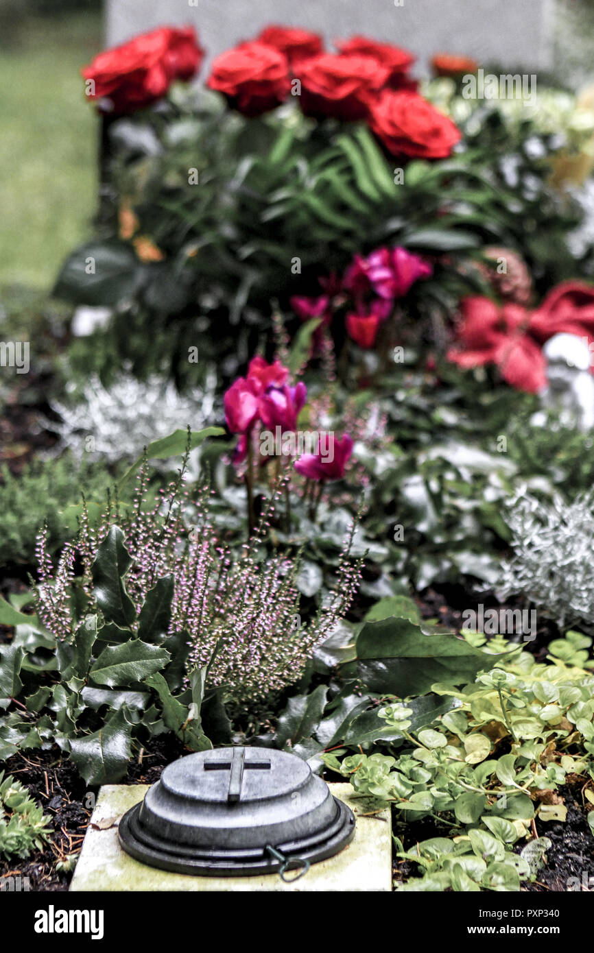 Geschmuecktes Grab auf einem Friedhof an Allerheiligen Stock Photo