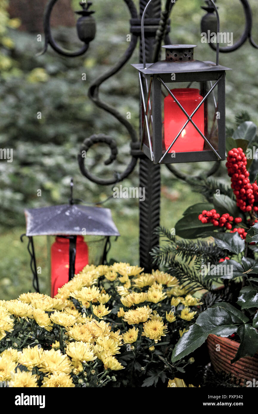 Geschmuecktes Grab auf einem Friedhof an Allerheiligen Stock Photo