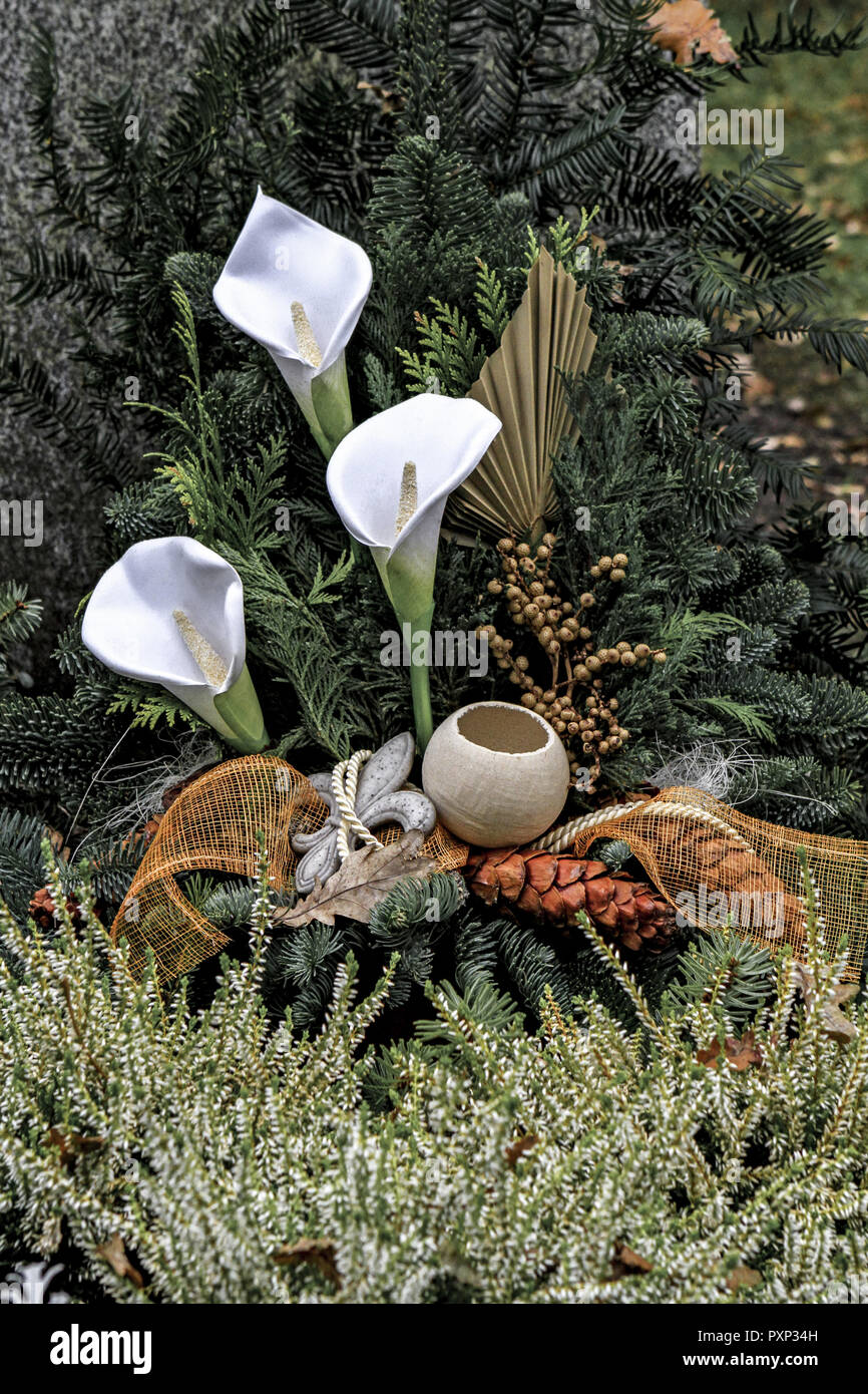 Geschmuecktes Grab auf einem Friedhof an Allerheiligen Stock Photo