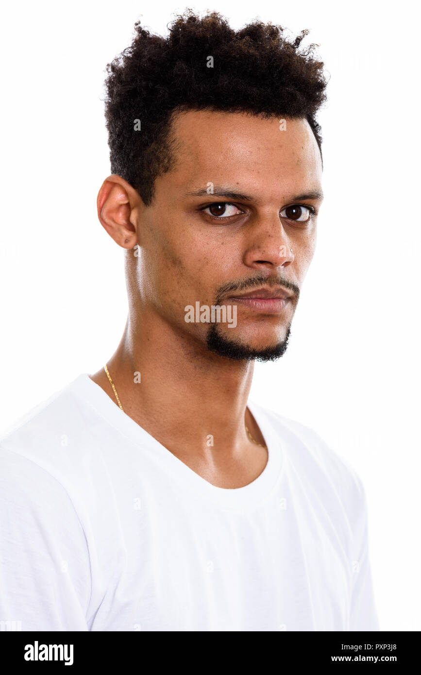 Face of young African man looking at camera Stock Photo - Alamy