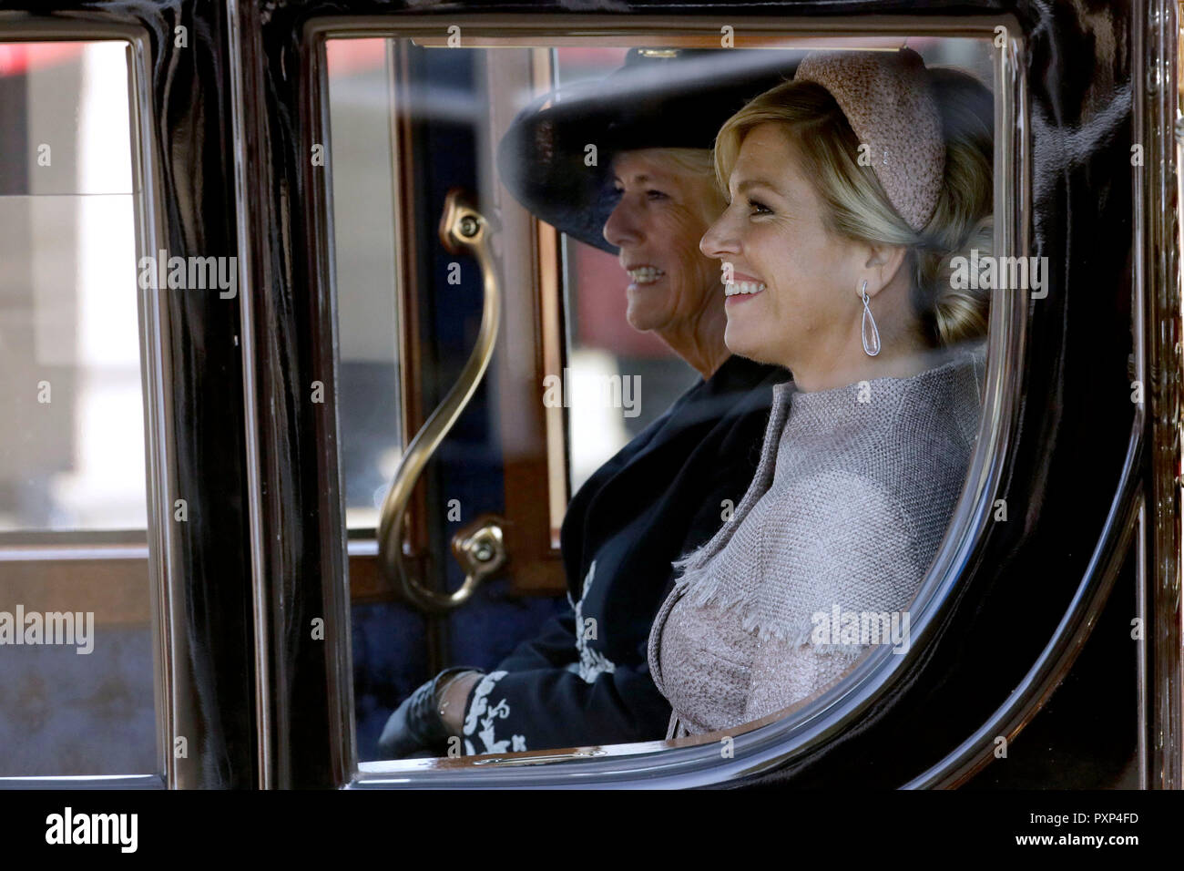 dutch-queen-maxima-and-the-camilla-the-duchess-of-cornwall-leave-in-a-horse-drawn-carriage-after-a-ceremonial-welcome-on-horse-guards-parade-in-london-for-dutch-king-willem-alexander-and-queen-maxima-state-visit-to-the-uk-PXP4FD.jpg