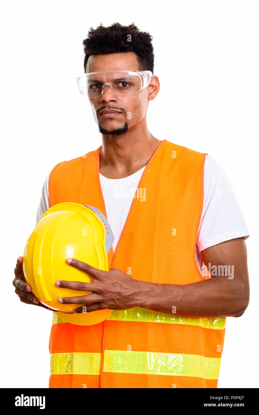 Young African man construction worker holding safety helmet with Stock ...