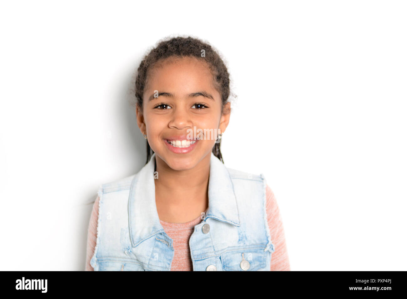 black Child girl portrait over gray background Stock Photo