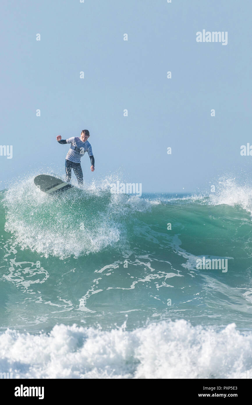 UK surfing A surfer competing in a longboard surfing competition at