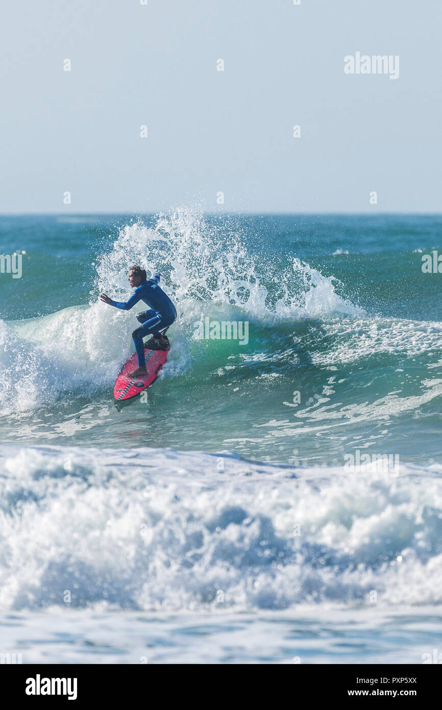 Surfing Newquay A surfer at Fistral in Newquay in Cornwall Stock