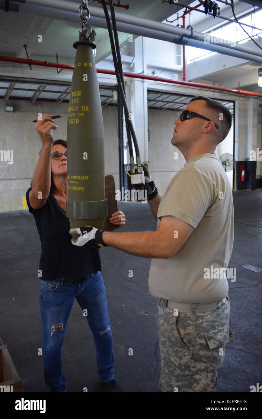 U.S. Army Reservists from the 295th Ordnance Company out of Hastings, Nebraska work with Army Civilians while completing their annual training at Crane Army Ammunition Activity. The Soldiers are receiving valuable experience handling munitions to increase mission readiness. Stock Photo