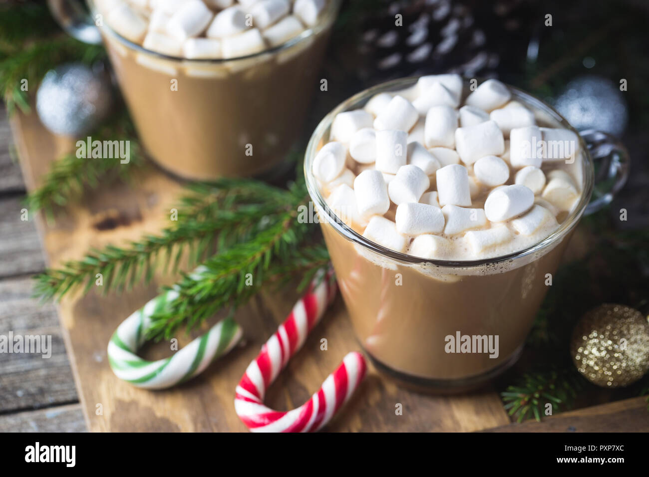 Two Glass Cups Of Cocoa With Marshmallow On A Wooden Background