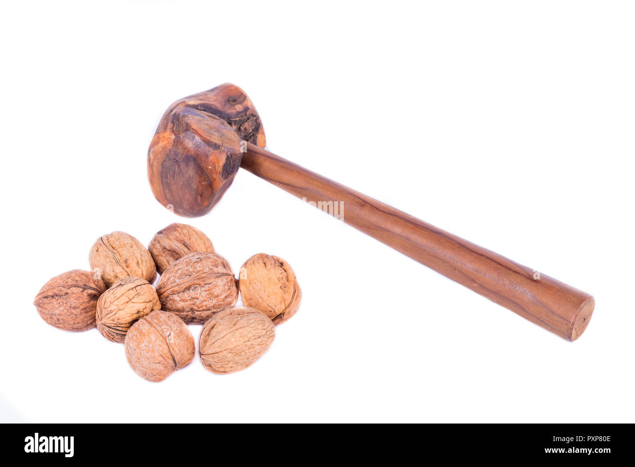 man breaking a walnut in a nutshell Stock Photo Alamy