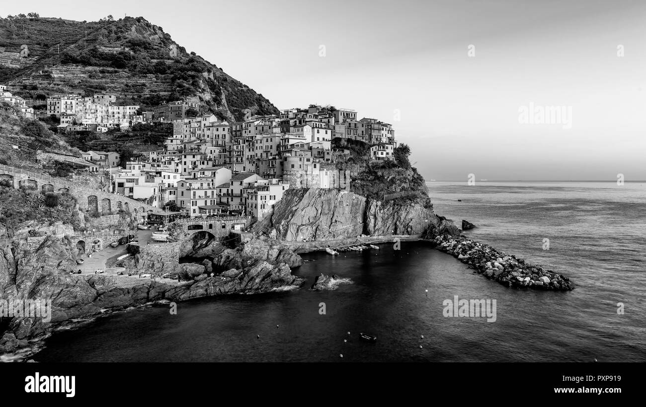 Beautiful black and white view of the village of Manarola at sunset, Cinque Terre, Liguria, Italy Stock Photo