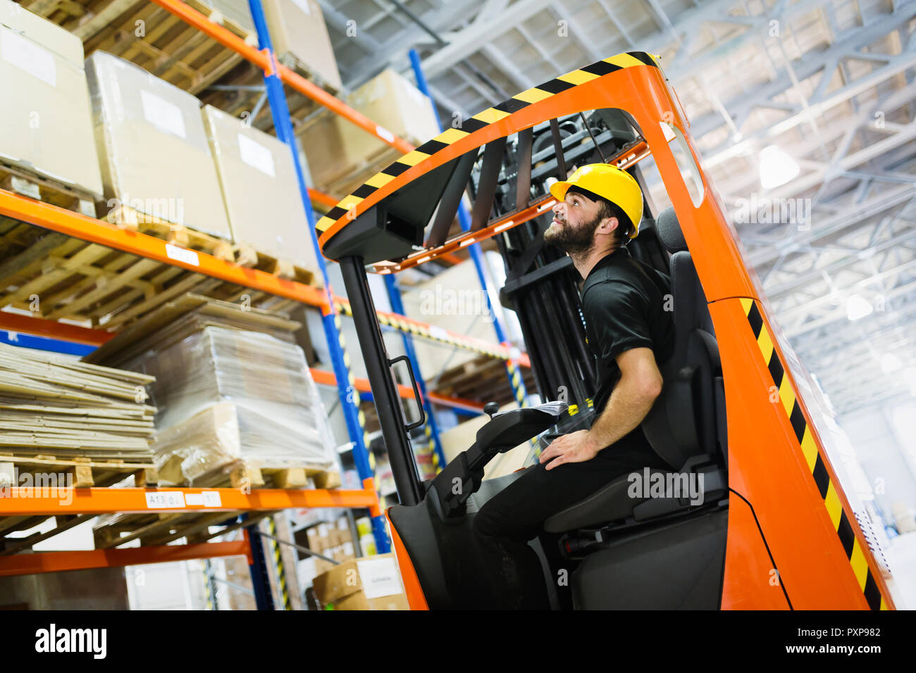 Logistics warehouse loader unloading delivery hi-res stock photography ...
