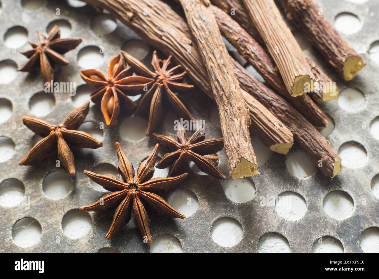 licorice root and anise on the table Glycyrrhiza glabra Stock Photo
