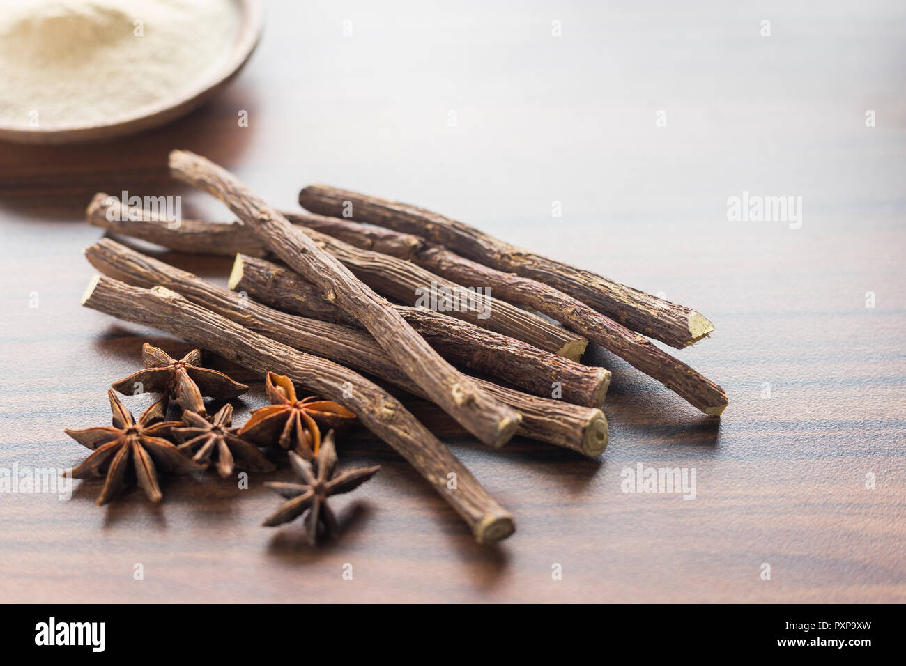 licorice root and anise on the table Glycyrrhiza glabra Stock Photo