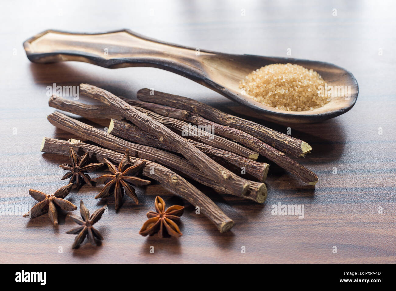 licorice root and brown sugar on the table Stock Photo Alamy