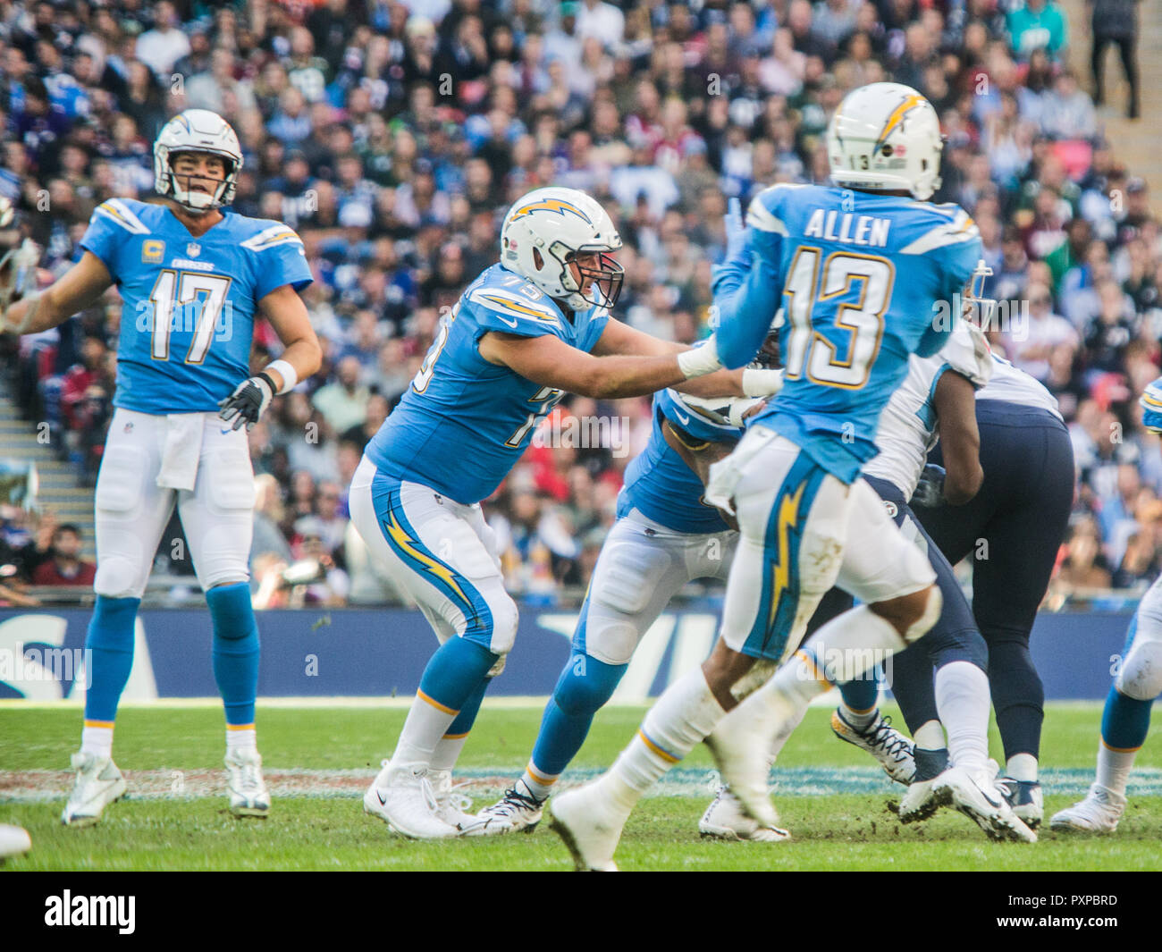 21st October 2018 LONDON, ENG - NFL: OCT 21 International Series - Titans at Chargers Los Angeles Chargers Quarterback Philip Rivers (17) and Los Angeles Chargers Offensive Guard Michael Schofield (75) and Los Angeles Chargers Wide Receiver Keenan Allen (13) - Credit Glamourstock Stock Photo