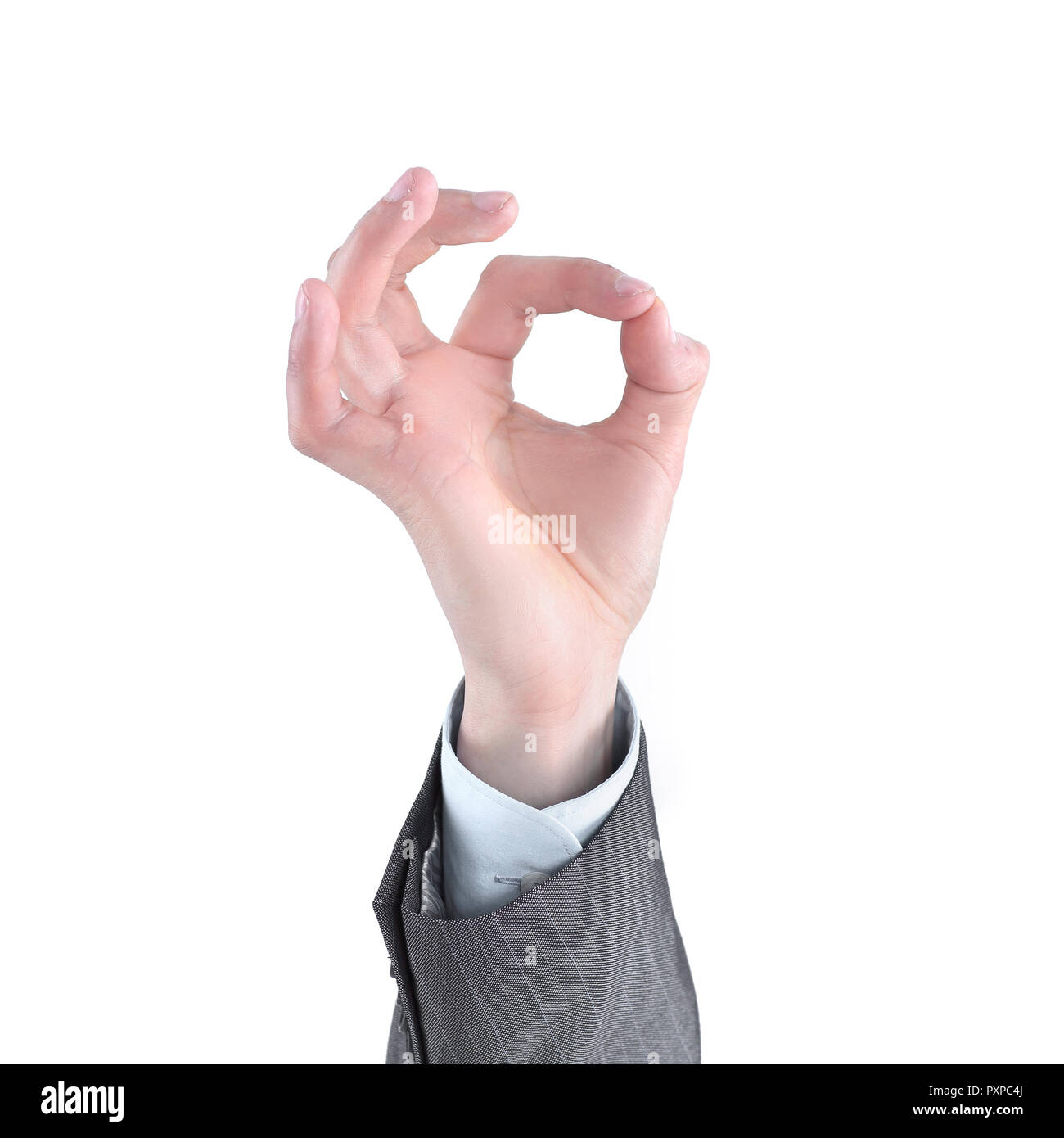 young businessman showing OK sign. isolated on a white background. Stock Photo