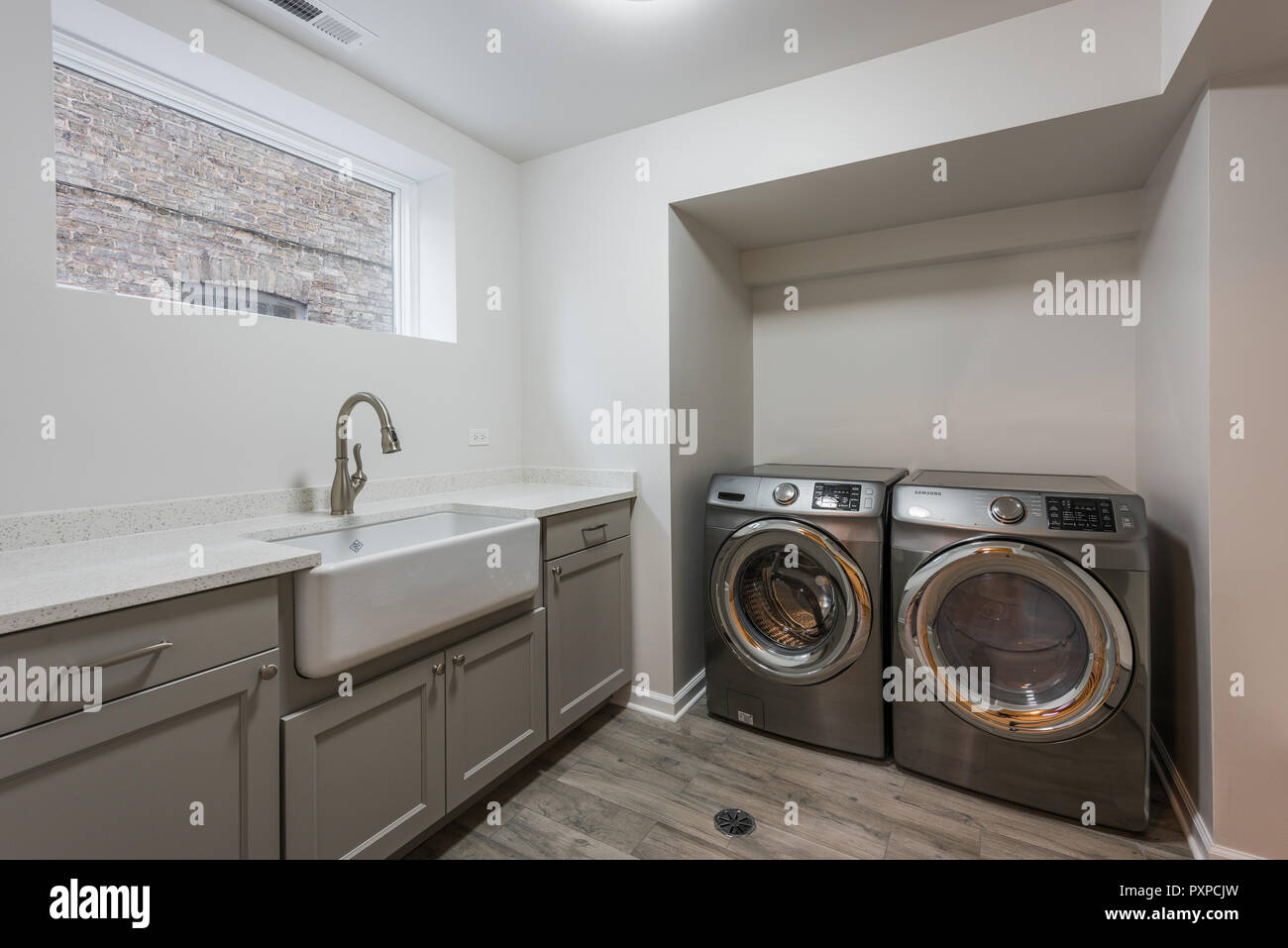 Laundry room in a renovated bungalow on the Northwest side Stock Photo ...