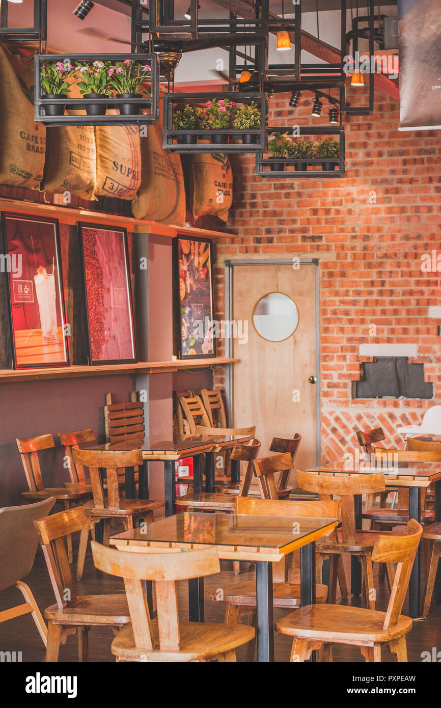 beautiful cosy cafe environment with tables and seating Stock Photo