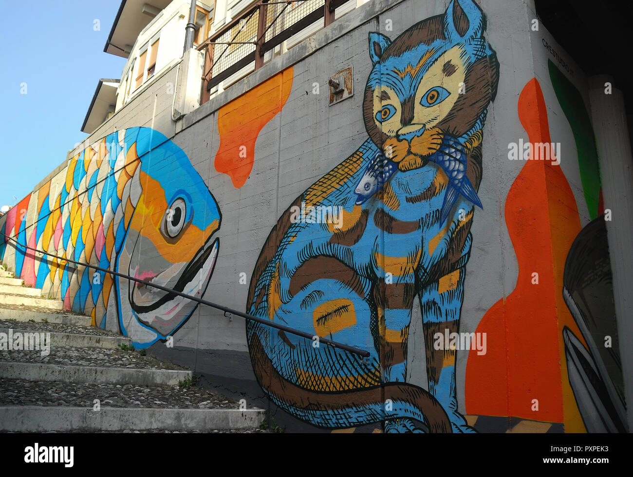 Bassano del Grappa, Veneto, Italy.  A mural painting that represents a big fish and a cat. Stock Photo