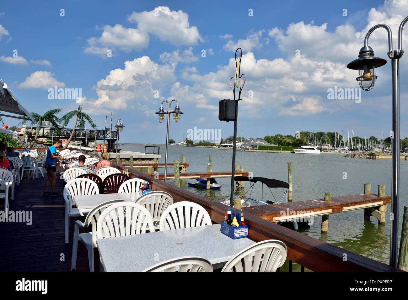Outside with waterside view eating at Pelican's Nest Restaurant by