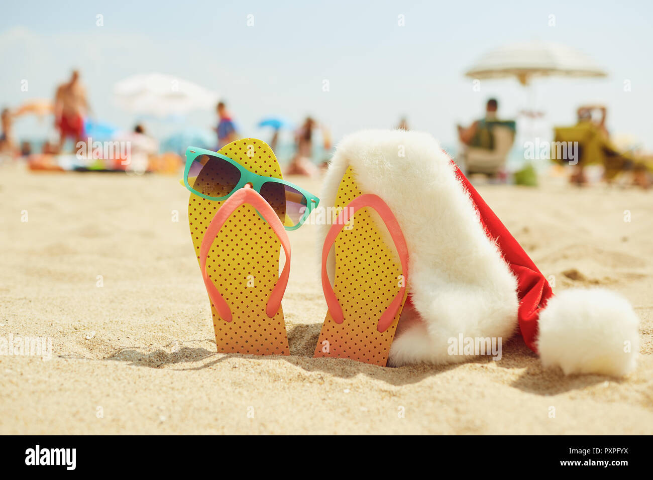 Santa's cap by the sea on Christmas Day Stock Photo Alamy