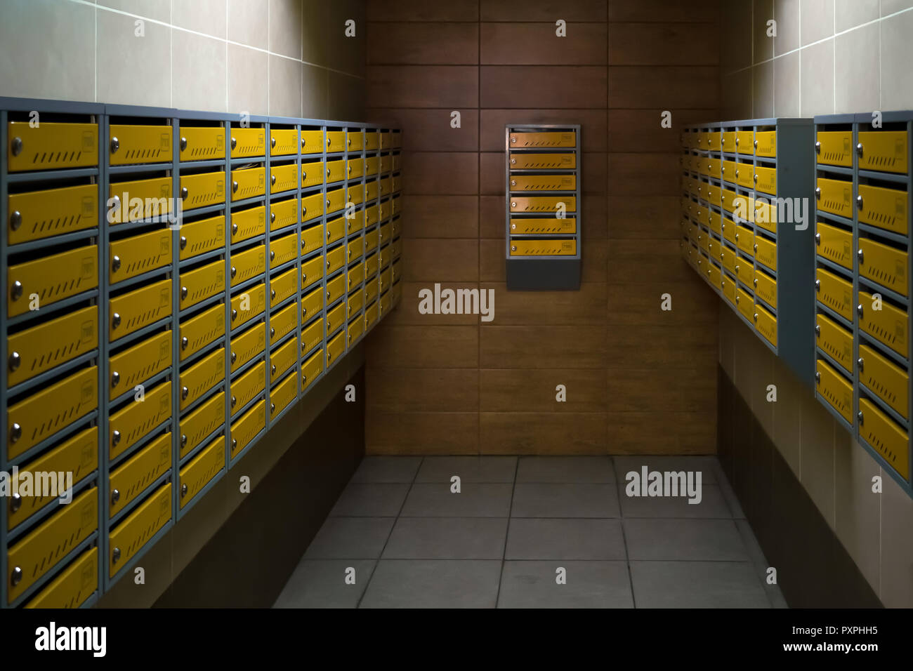 Entrance hall in an apartment building. Mailboxes in entrance hall of an apartment building. Stock Photo