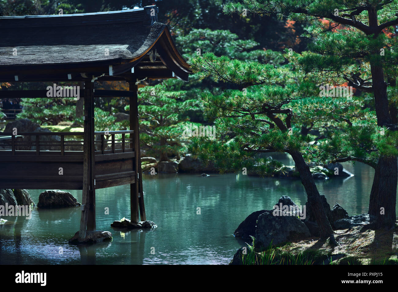 Fishing deck on a pond of a historic Japanese temple, Kinkaku-ji, Rokuon-ji, Zen Buddhist temple in Kyoto, Japan. Stock Photo