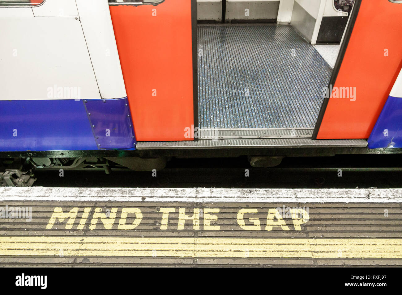 London England,UK,Lambeth South Bank,Waterloo Station,underground subway tube,platform,train,mind the gap,safety warning,floor markings,UK GB English Stock Photo