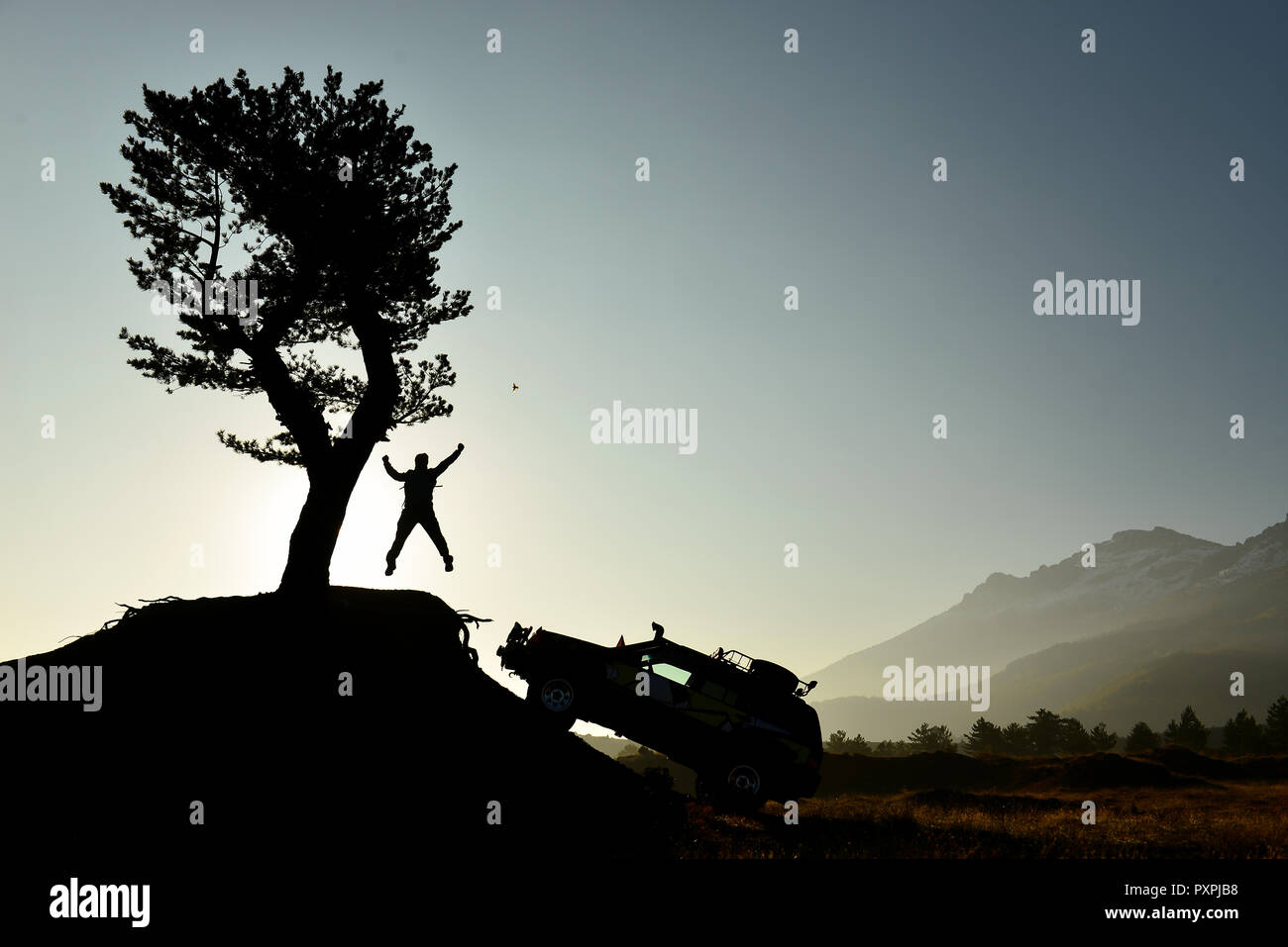land vehicle and man in pursuit of adventure Stock Photo Alamy