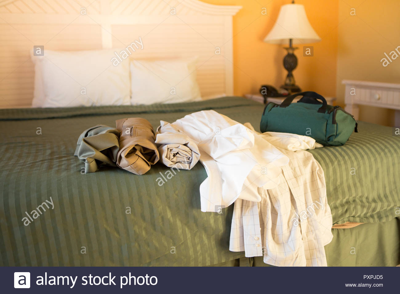 Mens Clothes On Bed Stock Photos & Mens Clothes On Bed Stock Images Alamy