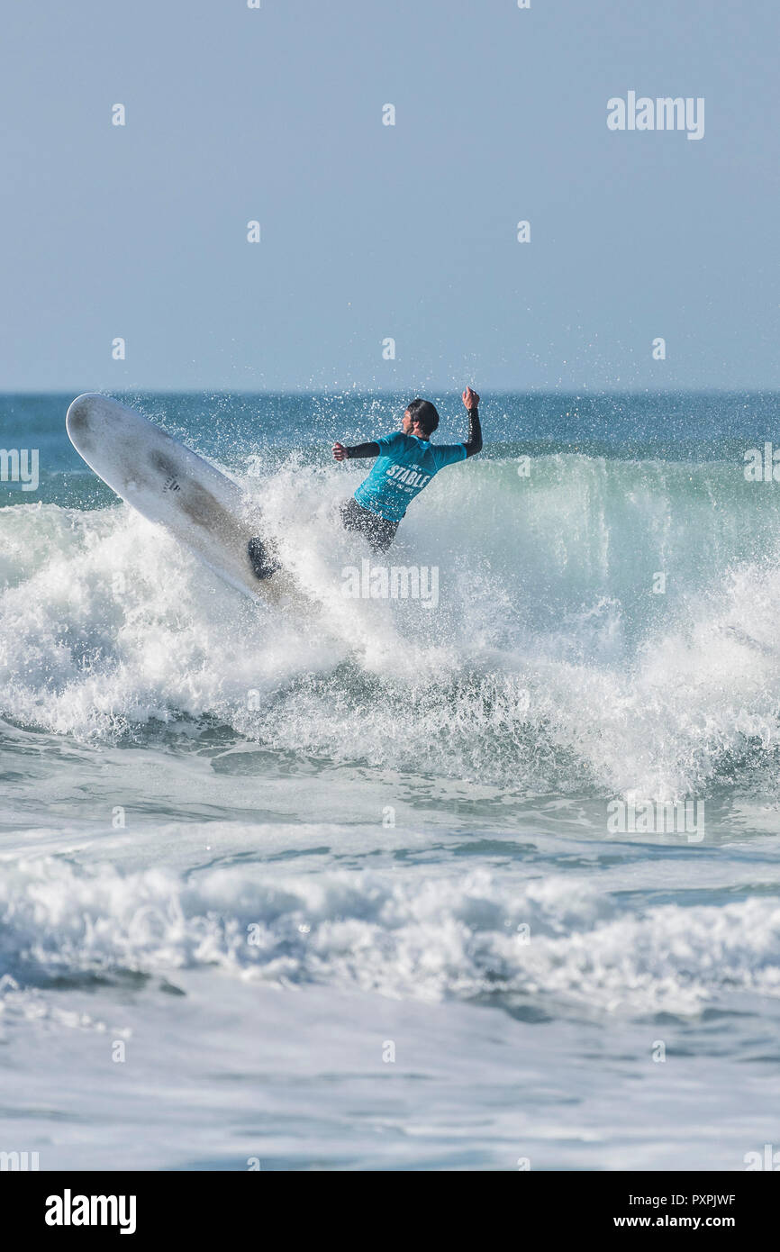 UK surfing A surfer competing in a longboard surfing competition at