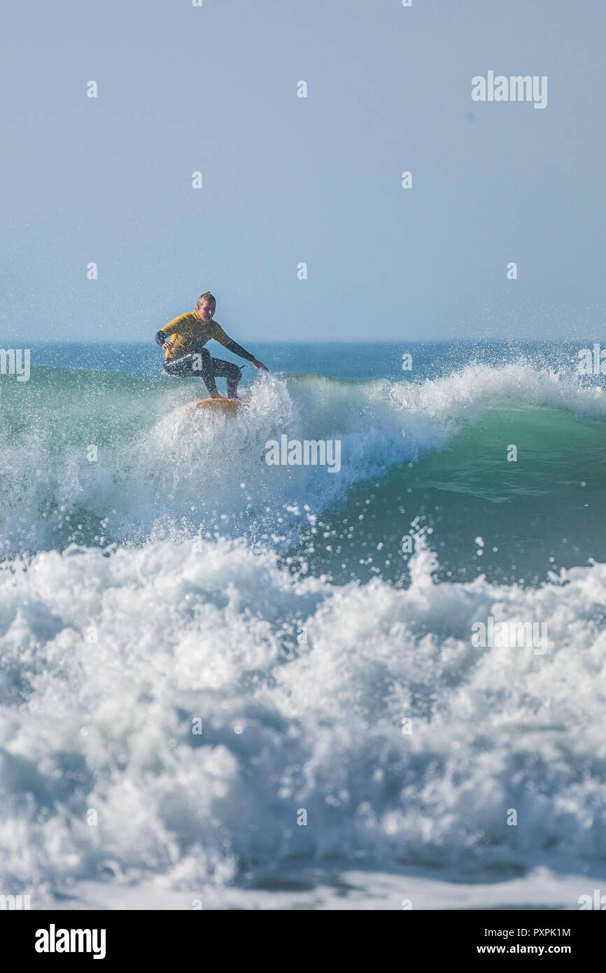 UK surfing A surfer competing in a longboard surfing competition at