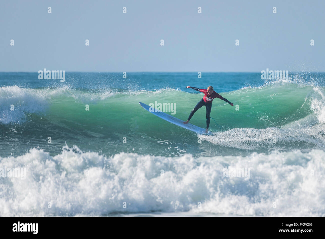 UK surfing A surfer competing in a longboard surfing competition at