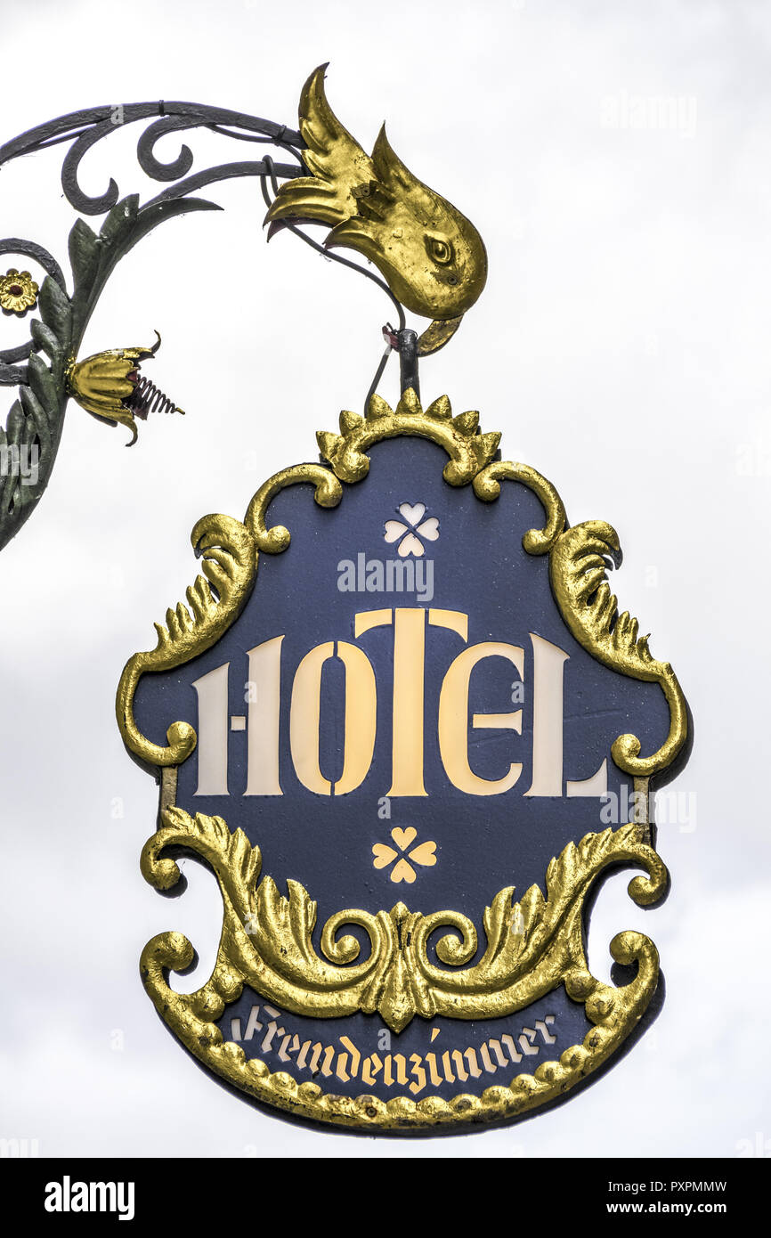 Hanging sign of a Hotel, Rothenburg ob der Tauber, Middle Franconia, Bavaria, Germany, Europe Stock Photo