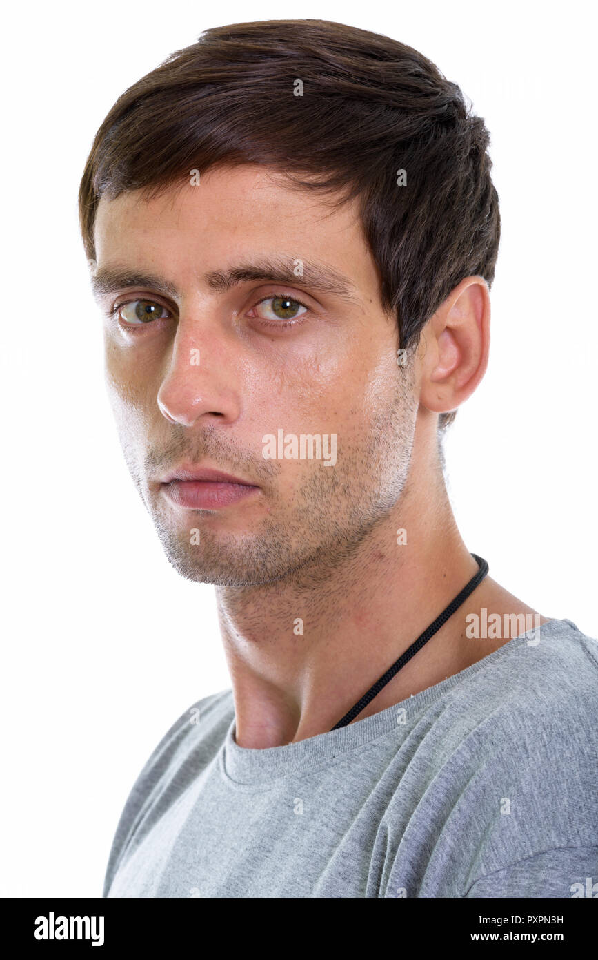Studio shot of face of young handsome man Stock Photo