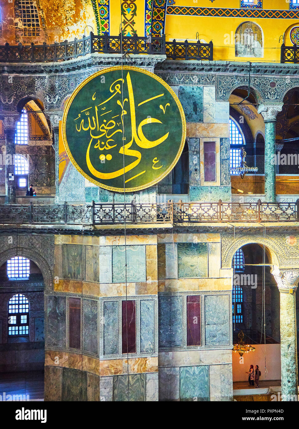 One of the eight Calligraphic Panes hanging from the level of the upper south gallery of the Nave of the Hagia Sophia mosque. Istanbul, Turkey. Stock Photo