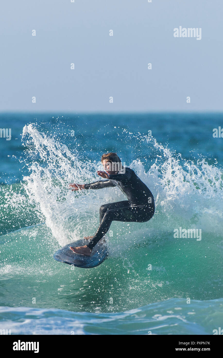 UK surfing - Spectacular surf action at Fistral Beach in Newquay in Cornwall. Stock Photo