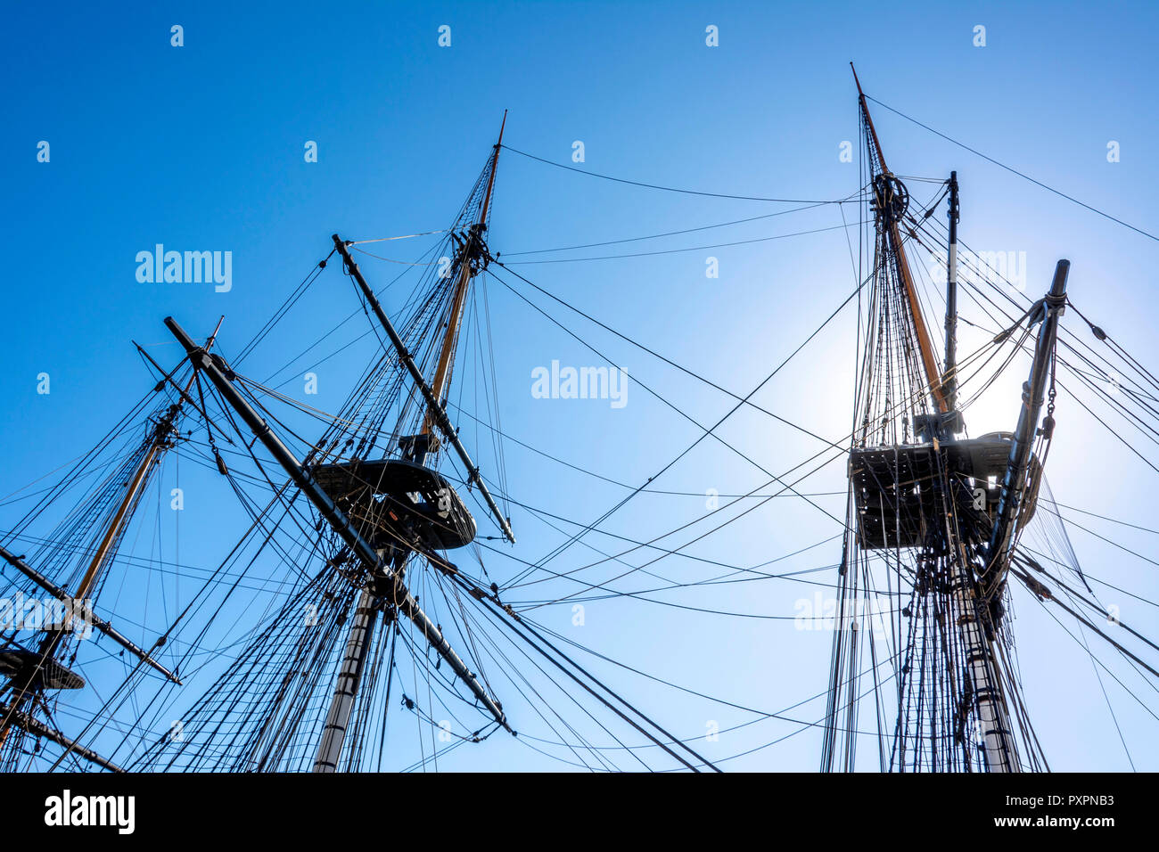 Sailing masts of the replica of French frigate Hermione in her dock at
