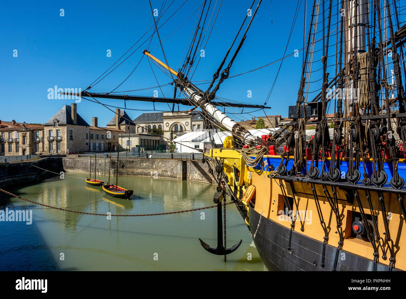 Replica of French frigate l'Hermione in her dock at the Arsenal of Rochefort, Charente Maritime, Nouvelle-Aquitaine, France Stock Photo