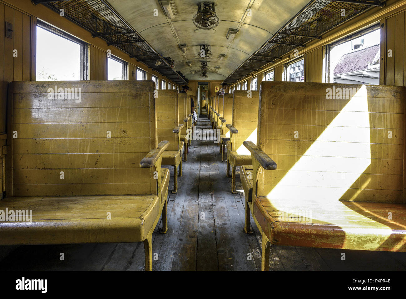 Old Train Passenger Carriage With Wooden Bench Seat Stock Photo