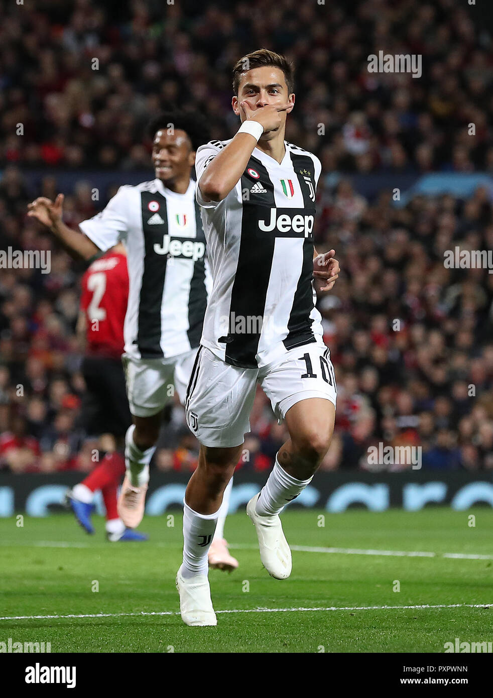 Juventus' Paulo Dybala celebrates scoring his side's first goal of the game  during the UEFA Champions League match at Old Trafford, Manchester Stock  Photo - Alamy