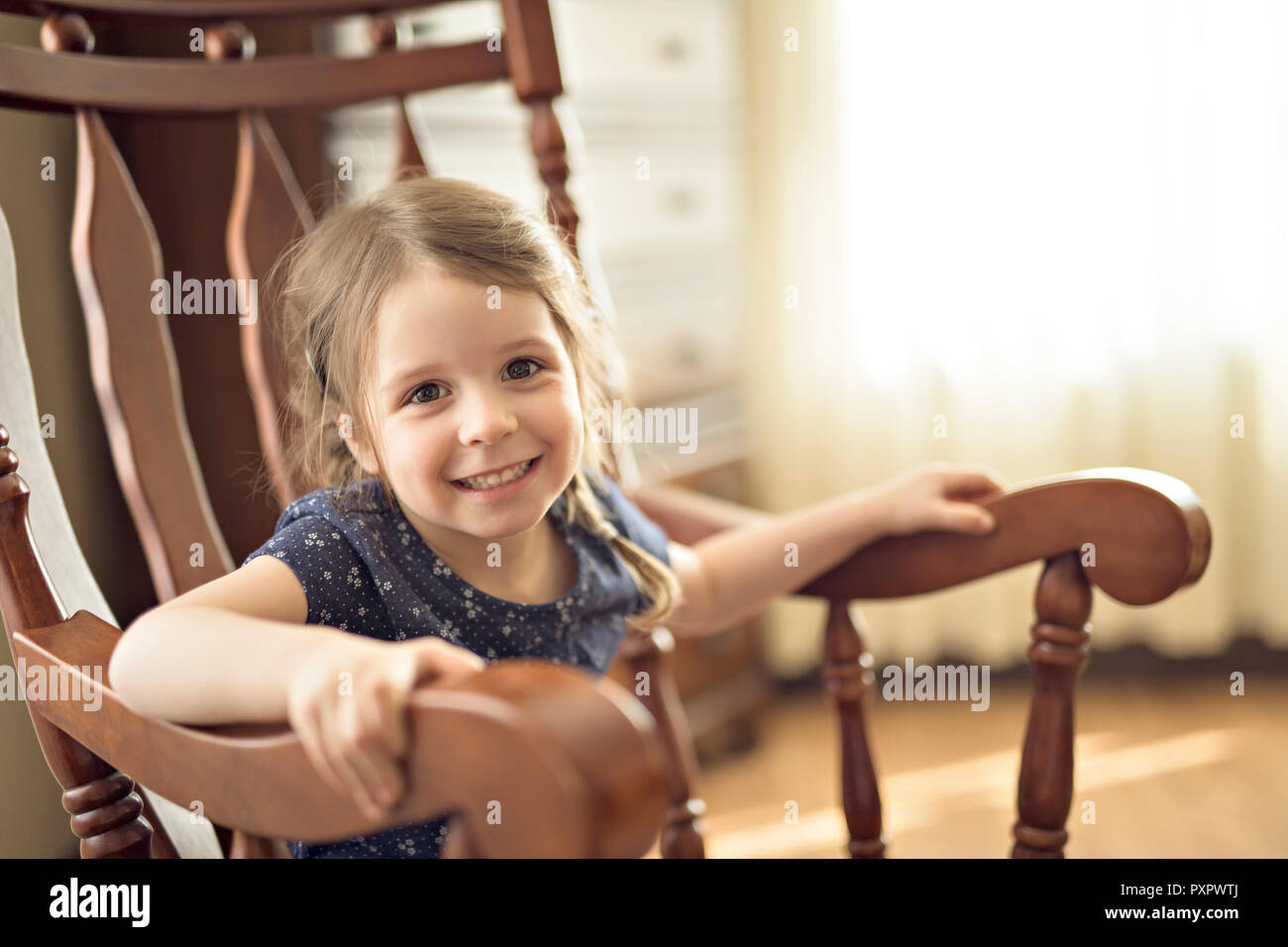 Beautiful little girl sit bedroom hi-res stock photography and images ...