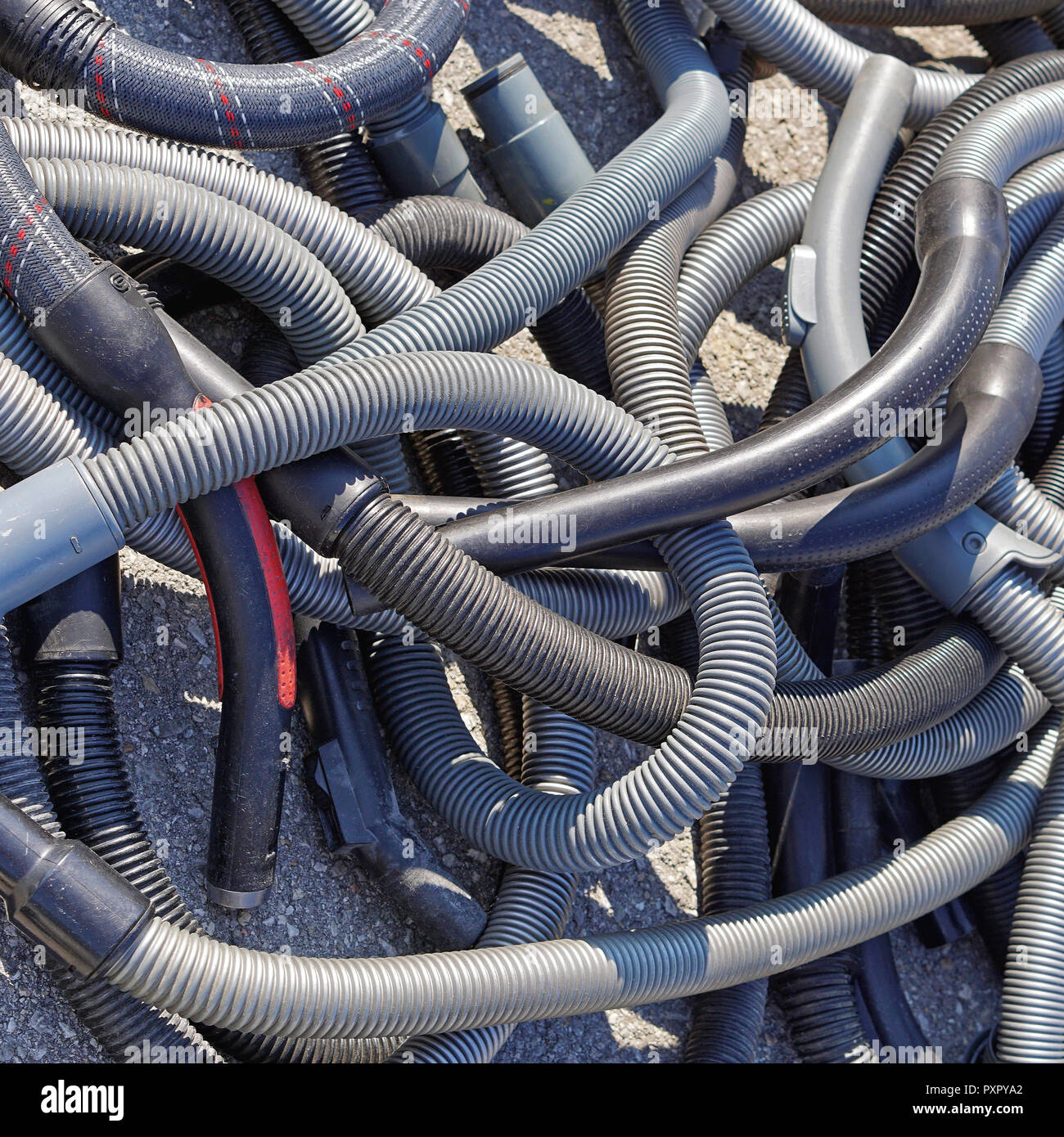 Flexible plastic hoses for vacuum cleaner Stock Photo