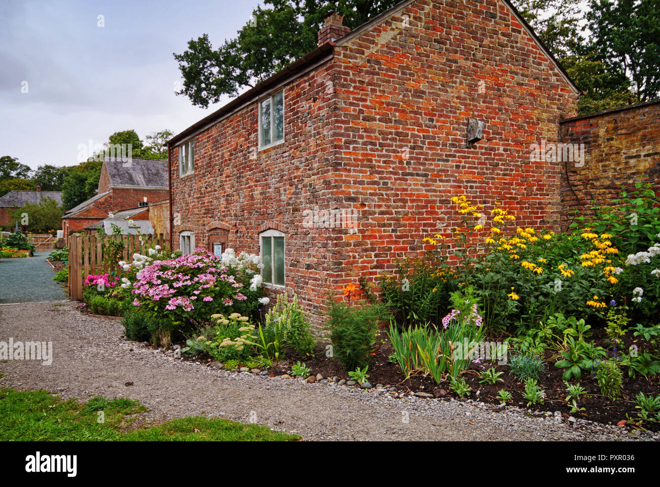 Flowers by the cottage in the grounds of Lytham Hall, Lancashire Stock Photo
