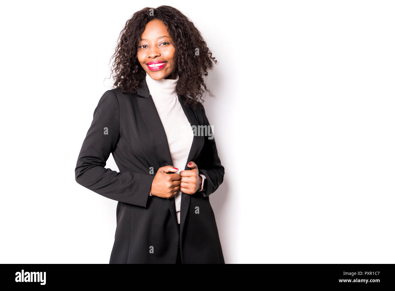 A black business woman poses for a portrait on studio white Stock Photo ...