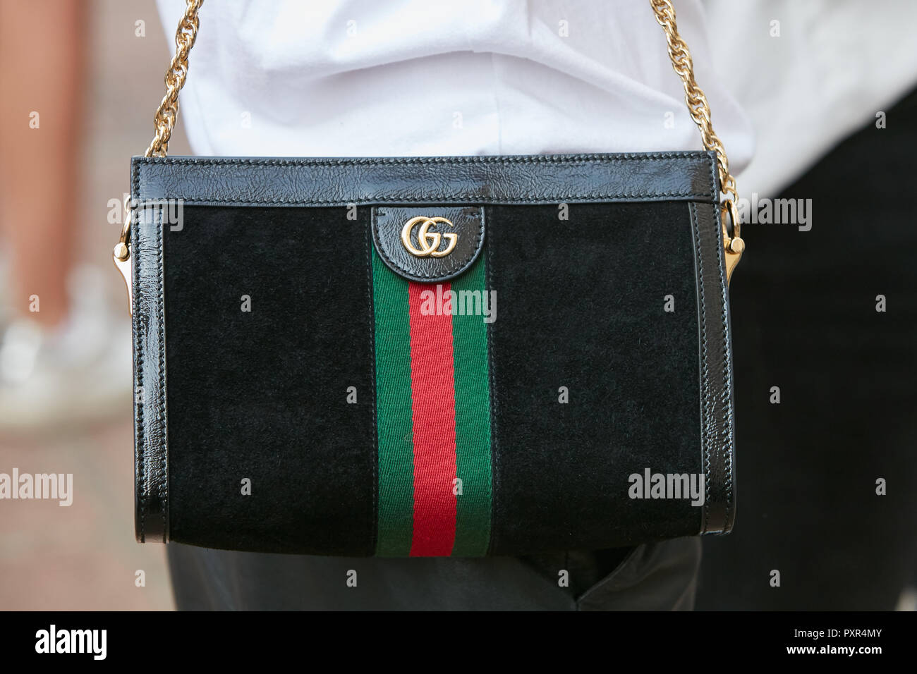 black leather gucci bag with red and green stripe