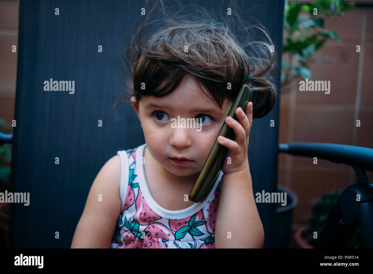 Baby with phone hires stock photography and images Alamy